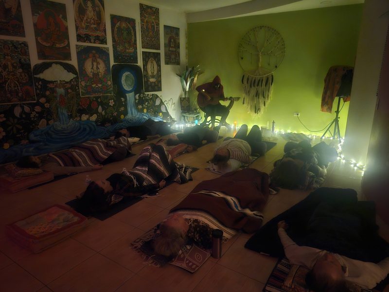 Healing guitar ceremony by candlelight at Shakti Rising